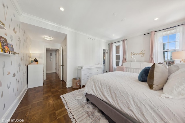 bedroom featuring baseboards, crown molding, and recessed lighting