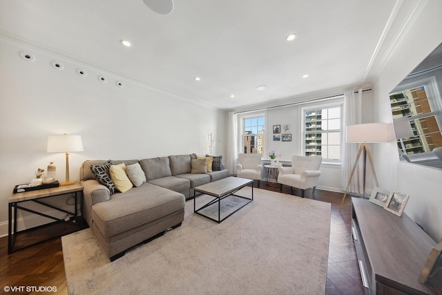 living room featuring ornamental molding, recessed lighting, and baseboards