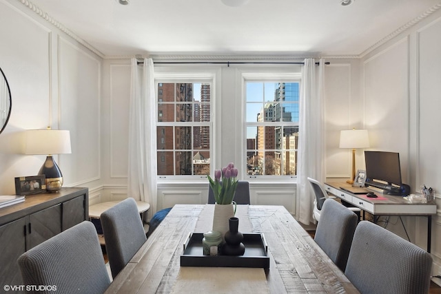 dining space with a decorative wall