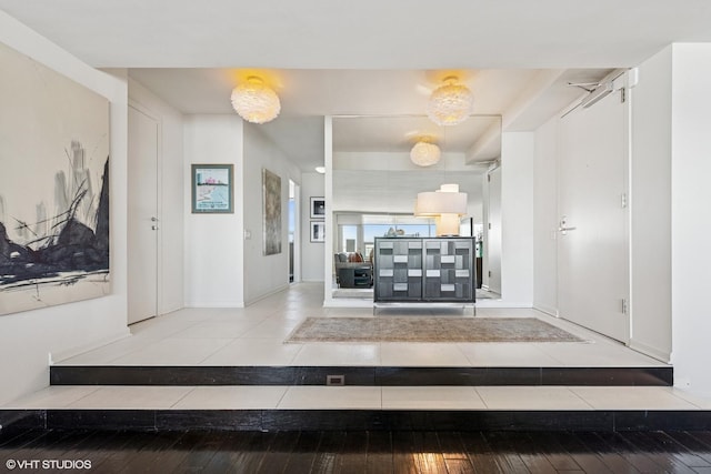 foyer with hardwood / wood-style flooring