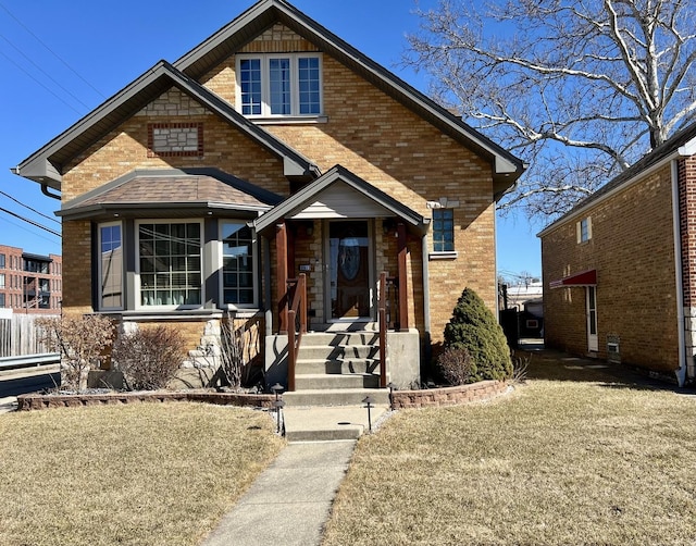 view of front of house featuring brick siding