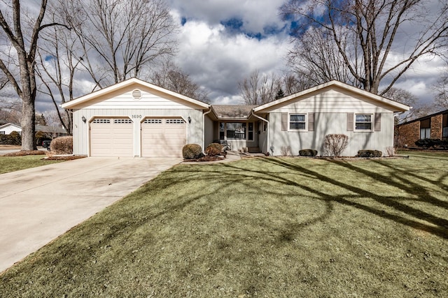 ranch-style home with a garage, driveway, and a front lawn