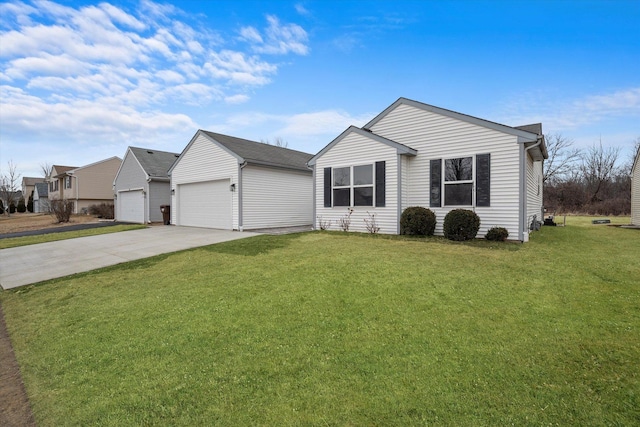 view of front facade with an attached garage, driveway, and a front lawn