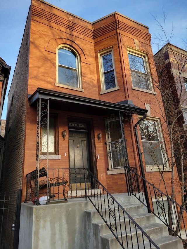 view of front of home with brick siding