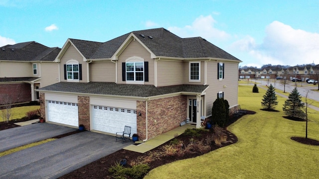 view of property exterior featuring driveway, roof with shingles, a lawn, and brick siding