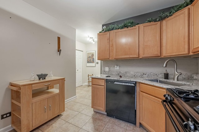 kitchen featuring a sink, black dishwasher, light stone countertops, tasteful backsplash, and gas range