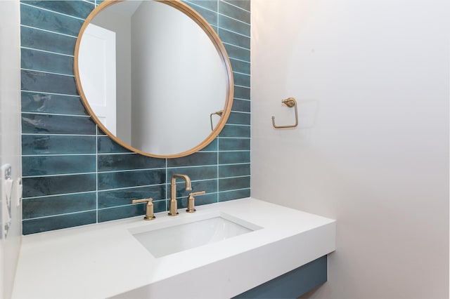 bathroom featuring backsplash and vanity