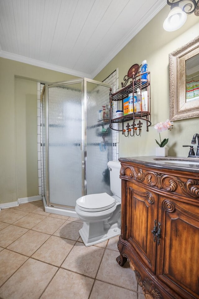 full bath with tile patterned floors, toilet, vanity, crown molding, and a stall shower
