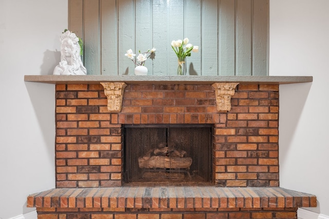 room details with a fireplace and baseboards
