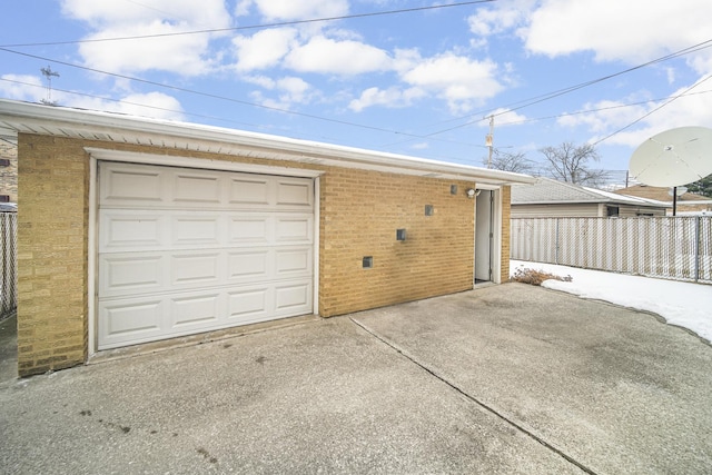 garage featuring fence