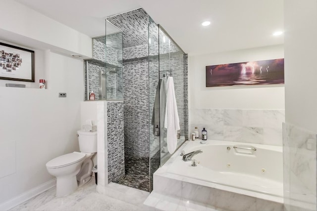 bathroom with a jetted tub, a stall shower, baseboards, and toilet