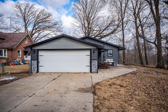 garage with fence