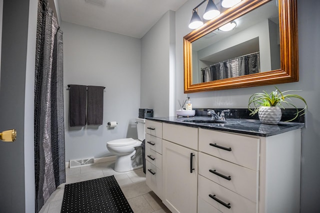 full bathroom with visible vents, toilet, vanity, tile patterned flooring, and baseboards