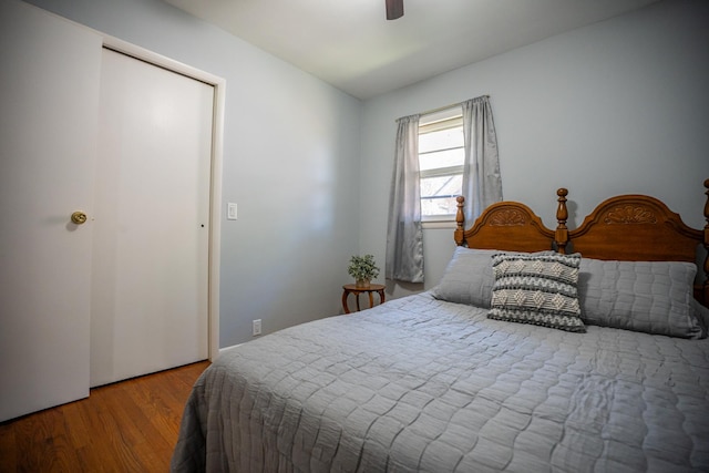 bedroom with wood finished floors and a ceiling fan