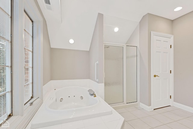 full bath with a tub with jets, a stall shower, tile patterned flooring, and visible vents