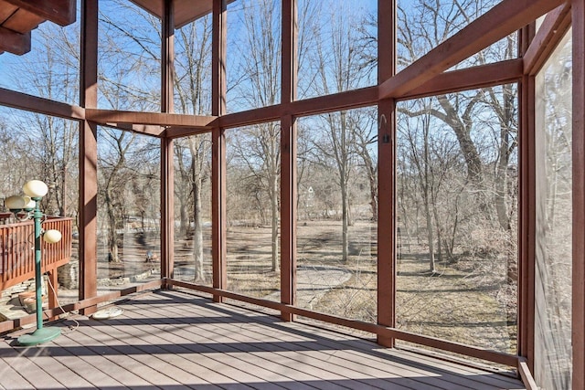 unfurnished sunroom featuring a healthy amount of sunlight