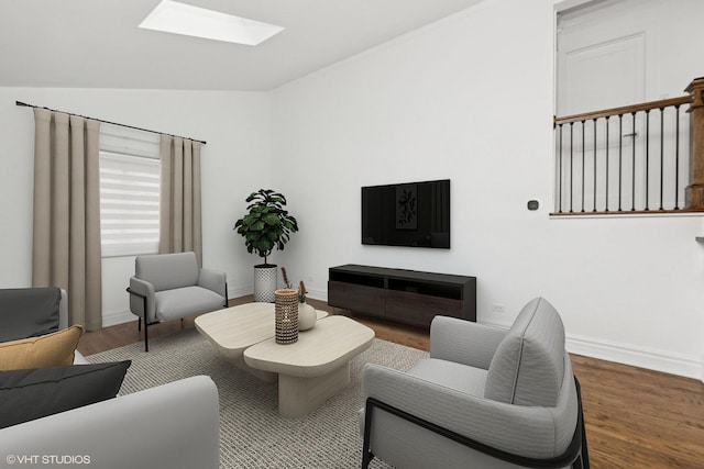 living area with lofted ceiling with skylight, wood finished floors, and baseboards