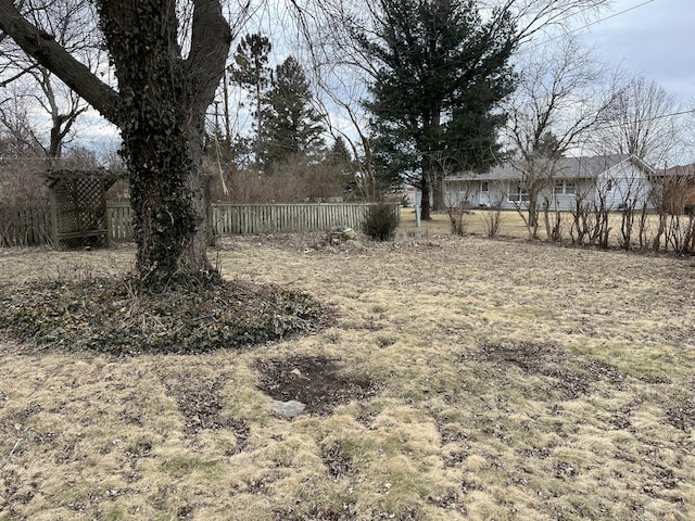 view of yard with fence