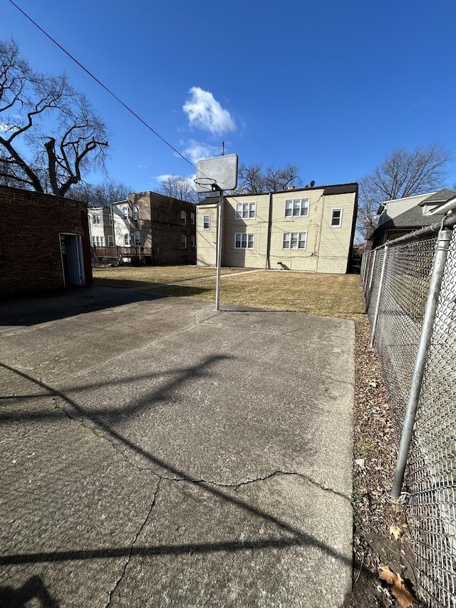 view of street featuring concrete driveway