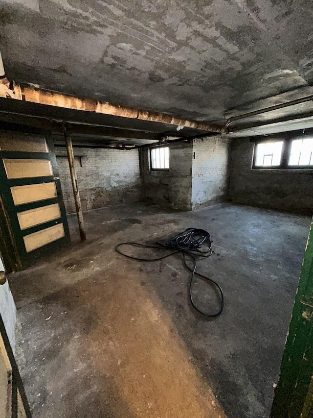 basement featuring plenty of natural light