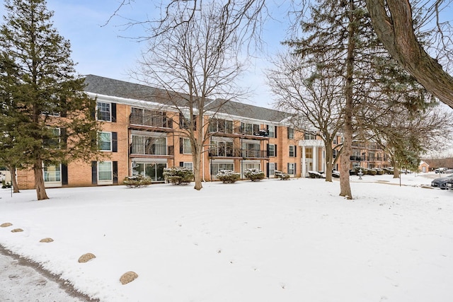 view of snow covered property