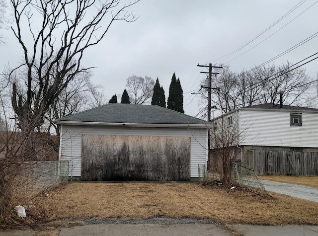 garage featuring fence