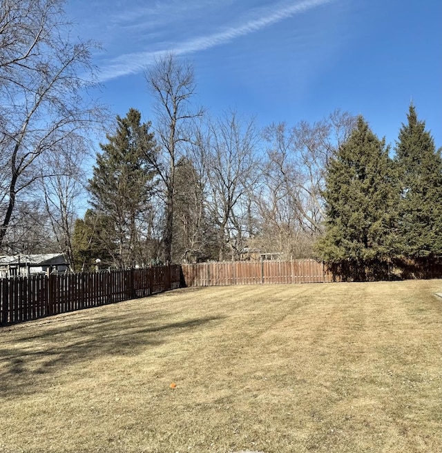 view of yard featuring fence