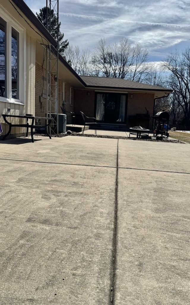 view of home's exterior with brick siding