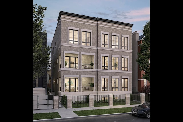 2832 N Racine Ave Unit 1E, Chicago, IL 60657 - back of house with a fenced front yard, brick siding, and a gate