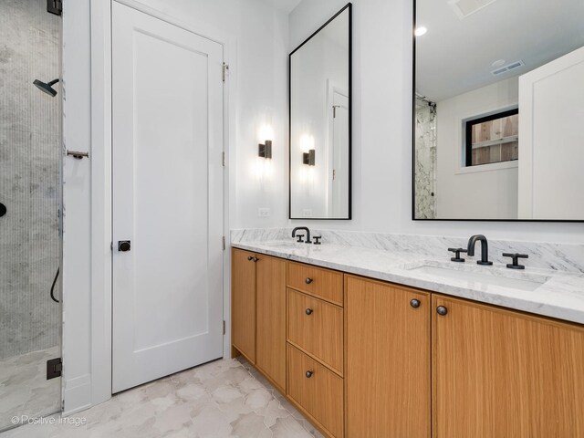 2832 N Racine Ave Unit 1E, Chicago, IL 60657 - bathroom with a shower stall, vanity, a freestanding bath, and marble look tiles