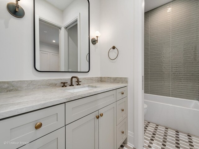 2832 N Racine Ave Unit 1E, Chicago, IL 60657 - laundry room featuring stacked washer / drying machine and cabinet space