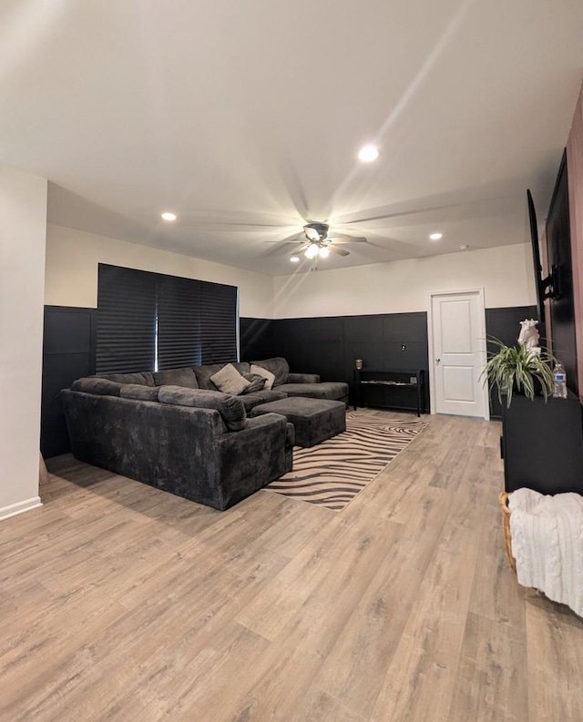 living room with recessed lighting and light wood-type flooring