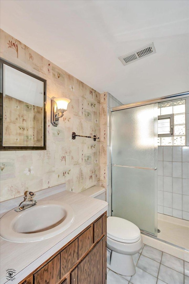 full bath featuring toilet, a stall shower, visible vents, and vanity