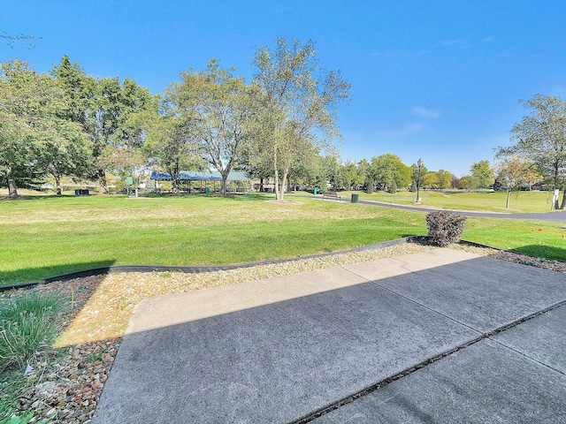 view of community featuring a lawn