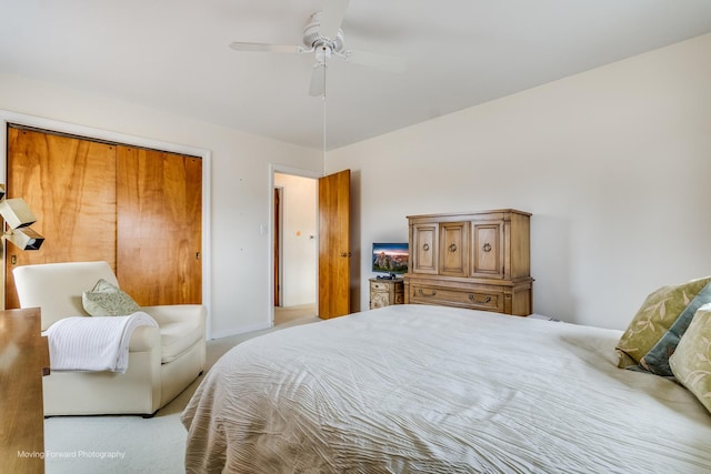 bedroom with a closet and a ceiling fan