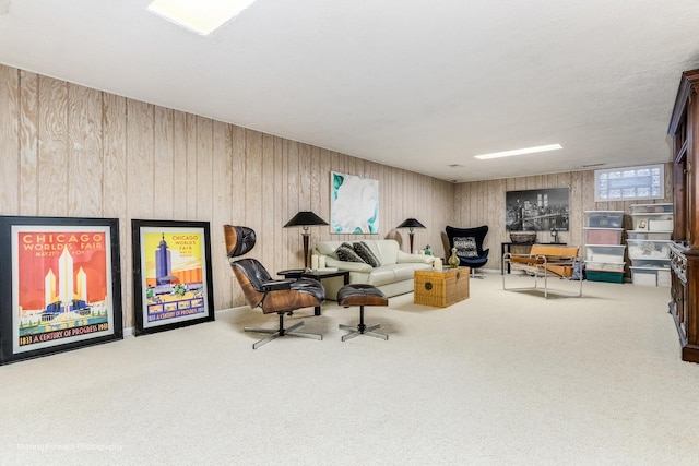 interior space with wood walls and carpet