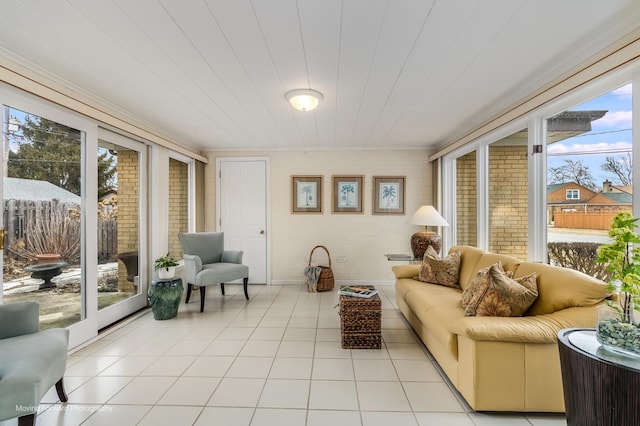 sunroom / solarium featuring wood ceiling