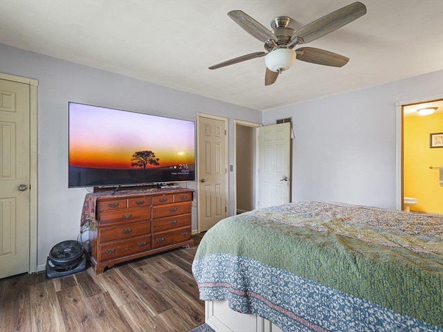 bedroom featuring ensuite bath, ceiling fan, and wood finished floors