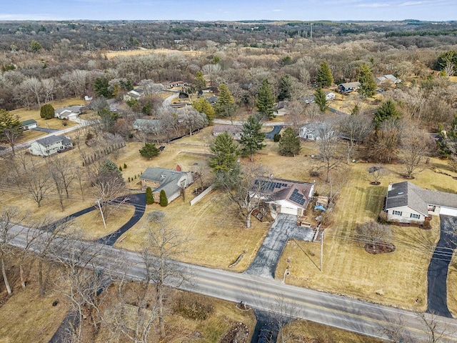 aerial view with a wooded view