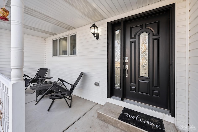 entrance to property with a porch