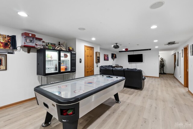 playroom featuring recessed lighting, baseboards, and light wood finished floors