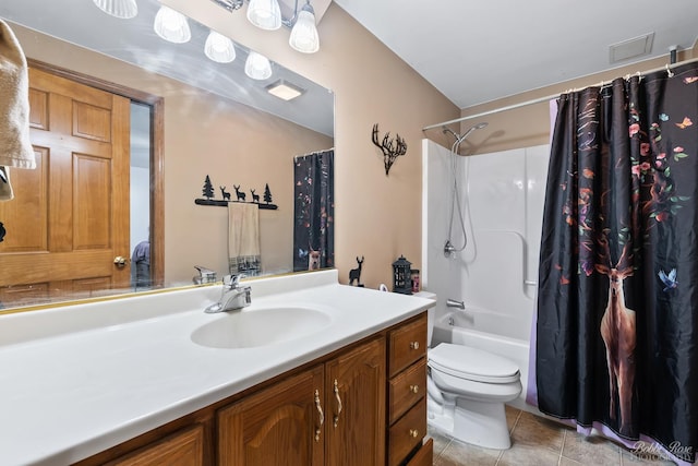 bathroom with visible vents, toilet, vanity, and tile patterned flooring