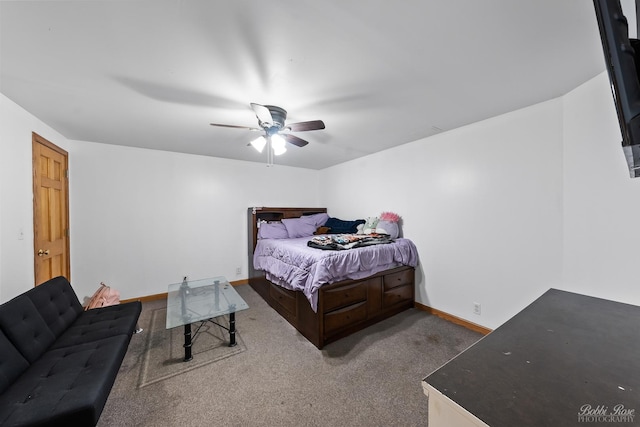 carpeted bedroom featuring ceiling fan and baseboards