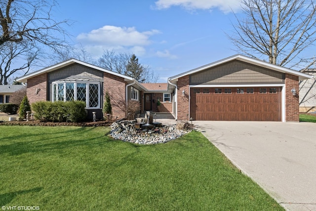 view of front of house featuring brick siding, a front lawn, concrete driveway, and an attached garage