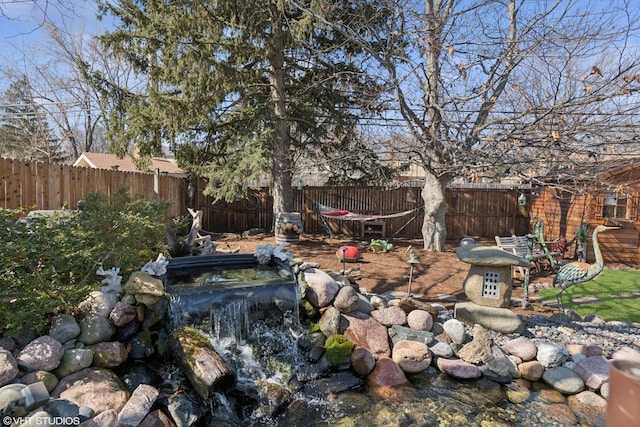 view of yard featuring a fenced backyard