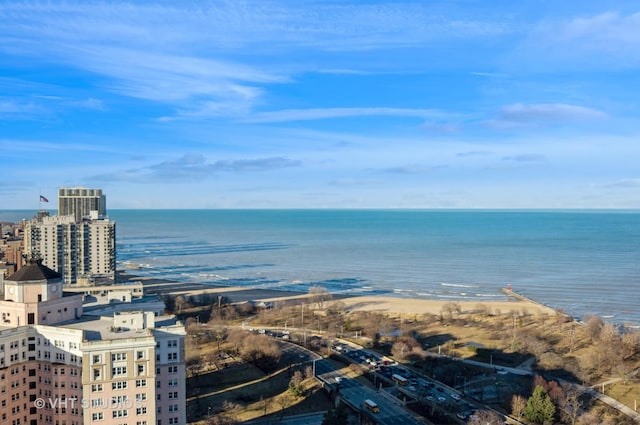 bird's eye view featuring a view of city and a water view