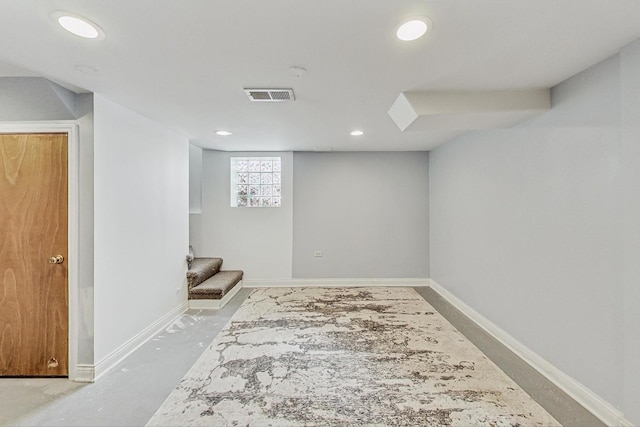 basement with stairs, recessed lighting, visible vents, and baseboards