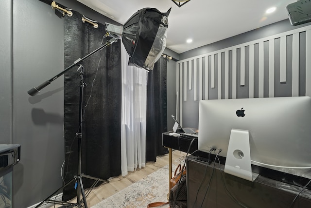 bathroom featuring recessed lighting, a stall shower, and wood finished floors