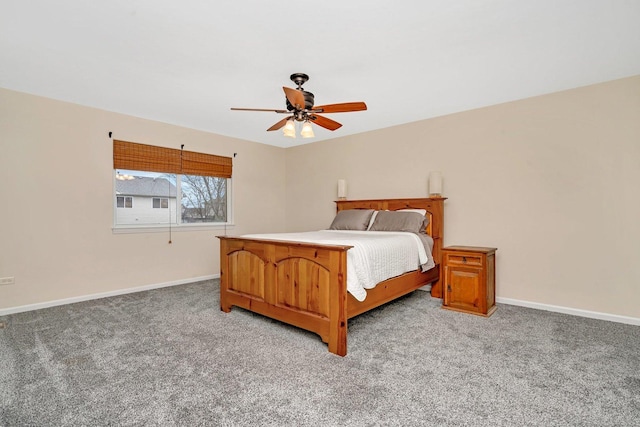 bedroom featuring light carpet, ceiling fan, and baseboards