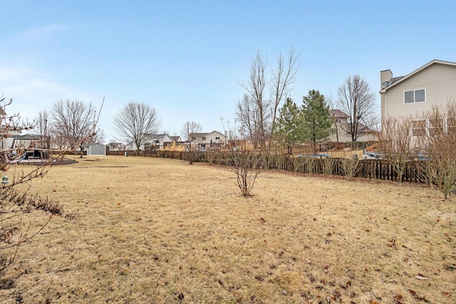 view of yard with fence